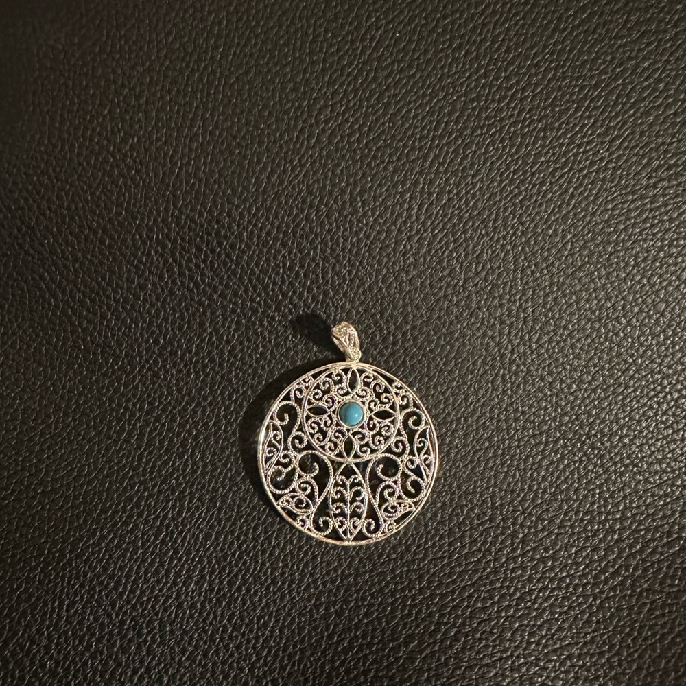 Elegant Silver Filigree Pendant with Turquoise Accent
